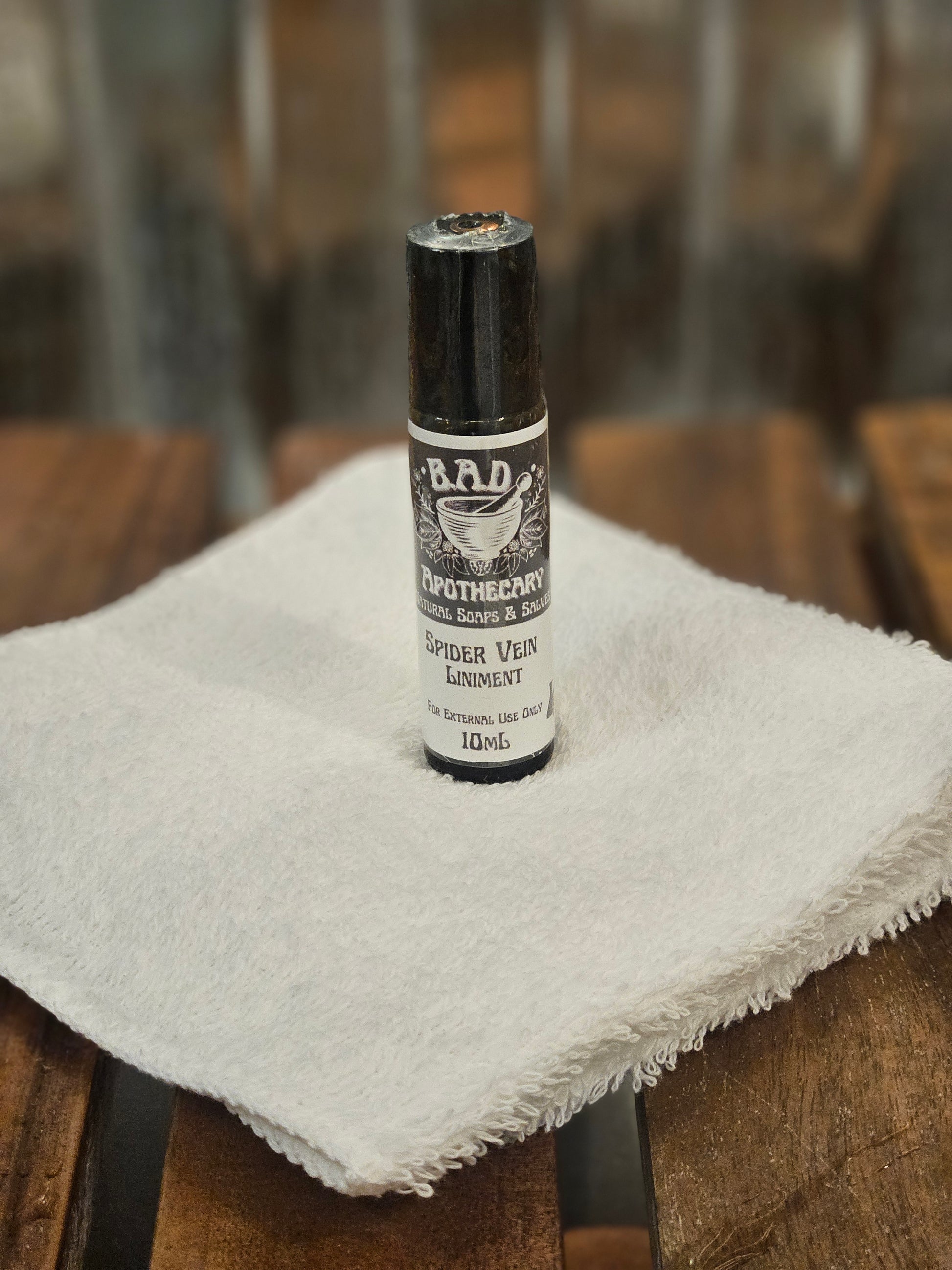 Spider Vein Liniment – Herbal Support for Tired Legs & Spider/Varicose Veins by B.A.D. Apothecary- 10 ML Roller Bottle